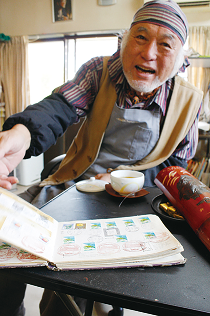 笑う西村文男さん